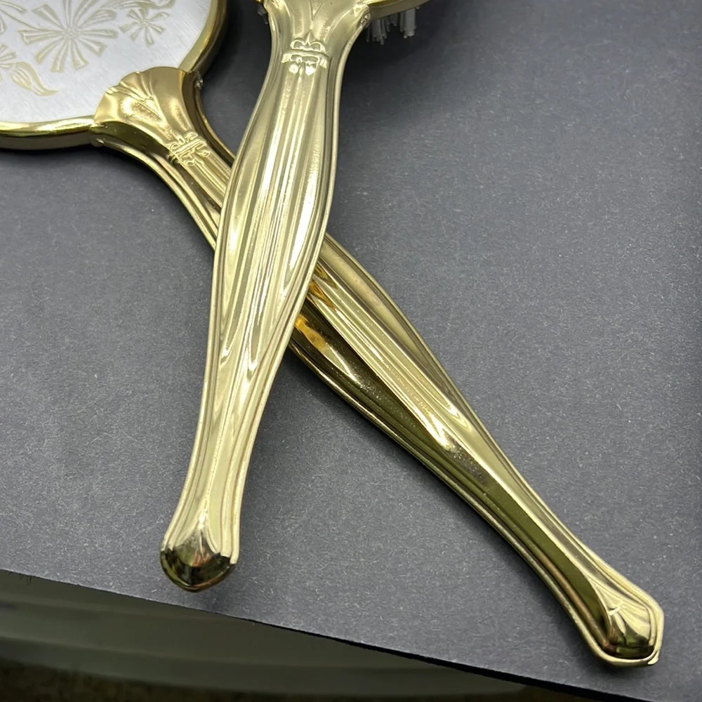 Vintage flower vanity hand mirror and brush